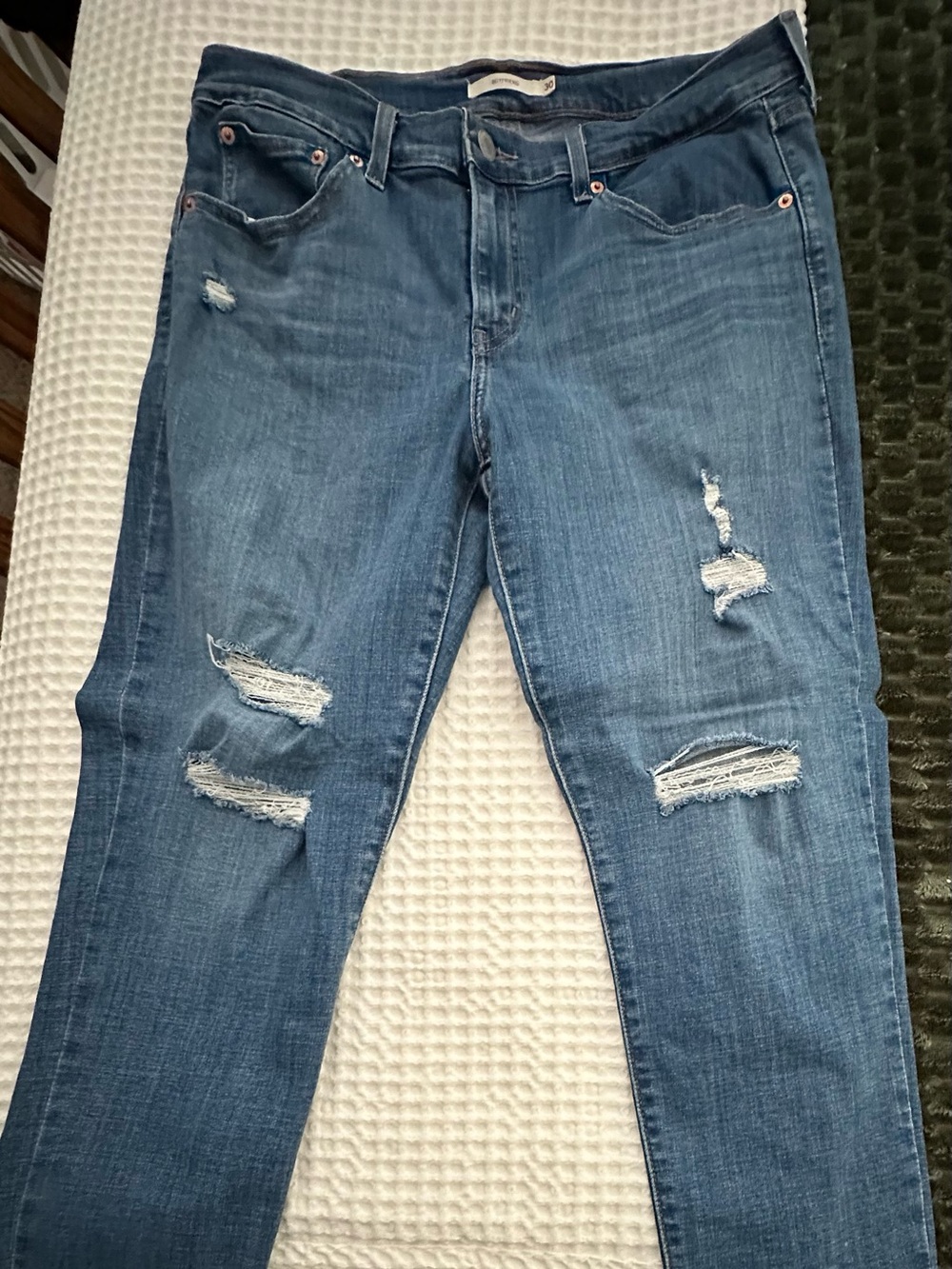 Distressed Women's Blue Denim Jeans